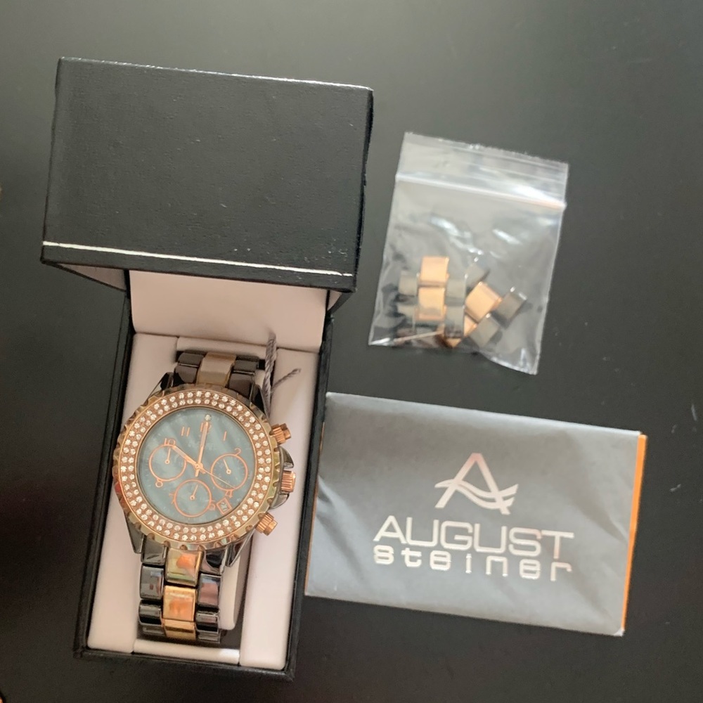 August Steiner rose gold crystal blue face watch